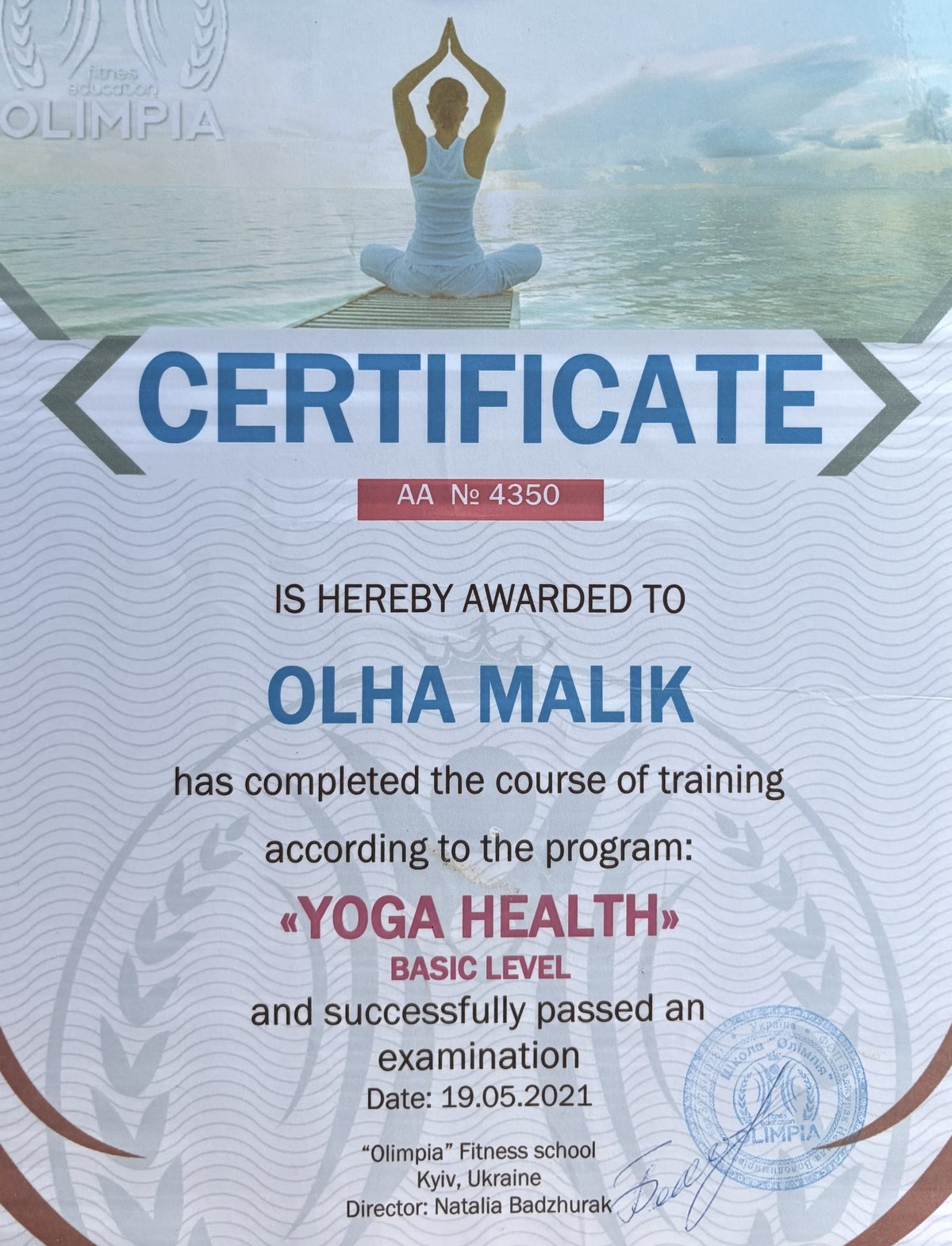 Yoga teaching certificate issued to Olha Malik by the Olimpia fitness school, Kyiv, 2021